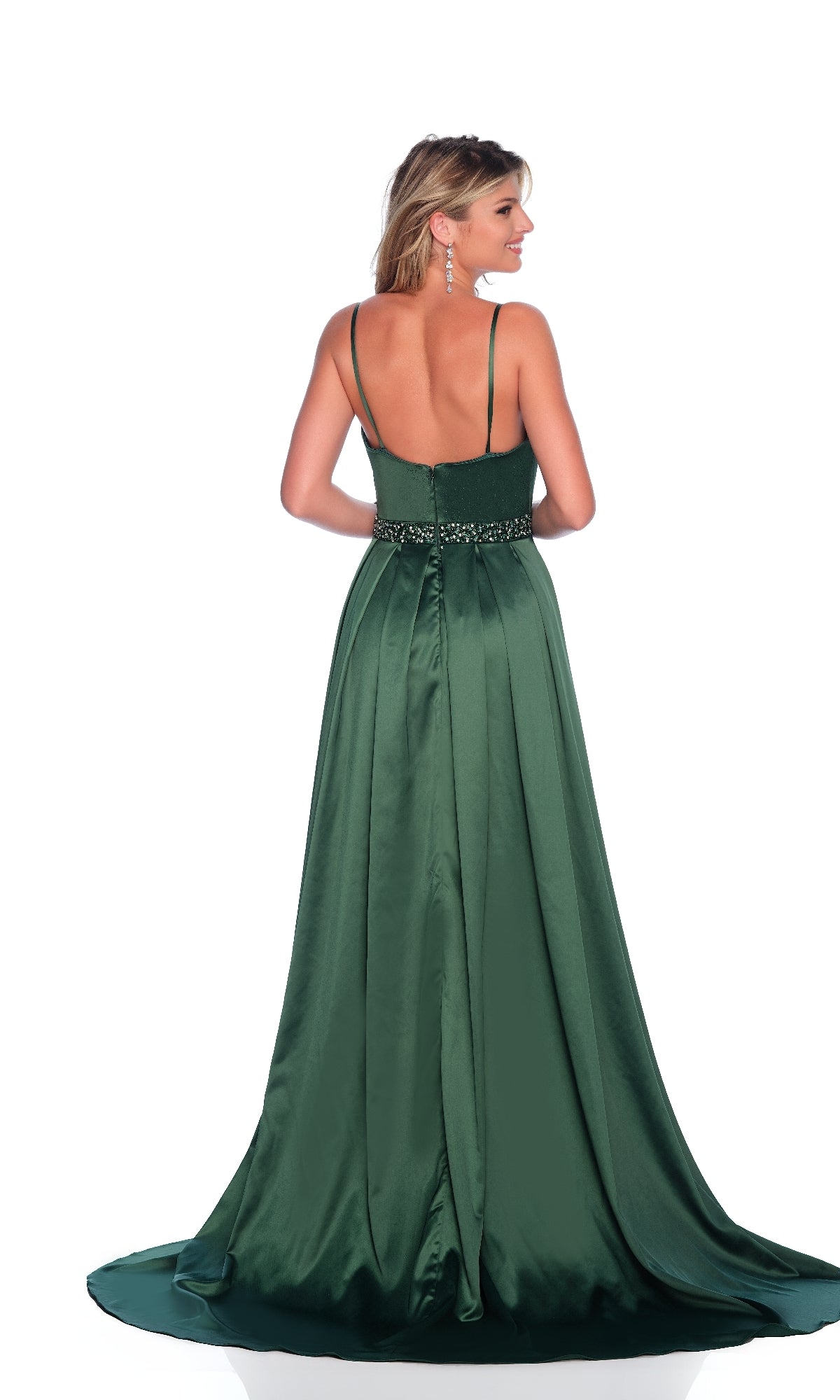 A woman stands with her back to the camera in the Dave and Johnny 11971 long prom dress, featuring dark green satin, an a-line silhouette, thin straps, and an embellished waistband.